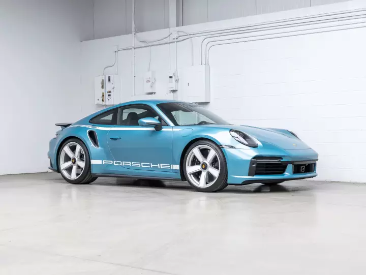 Porsche 911 Turbo 50 Years Edition (992) painted in Ipanema Blue Metallic