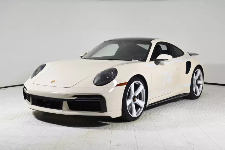 Porsche 911 Turbo 50 Years Edition (992) painted in Creme White