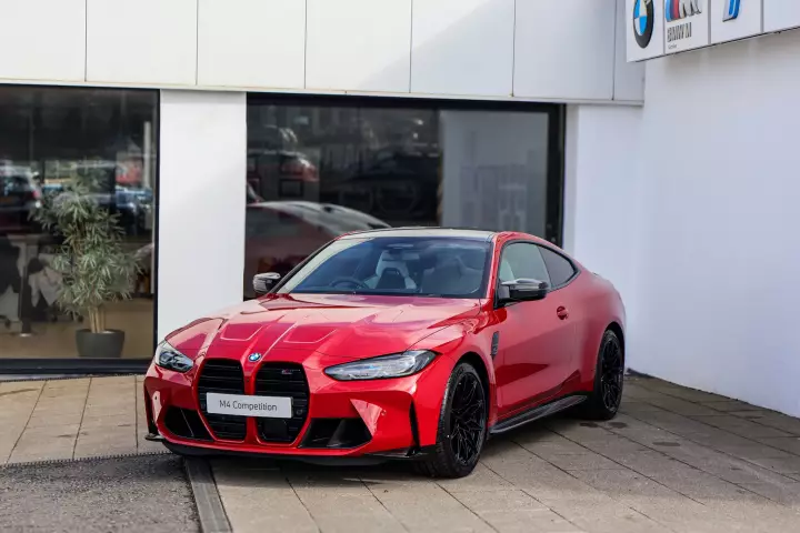 BMW M4 (G82) painted in Imola Red II