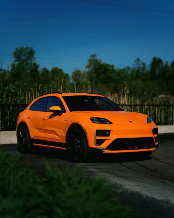 Porsche Macan Electric painted in Gulf Orange