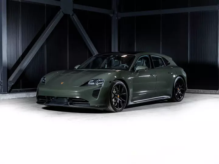 Porsche Taycan Sport Turismo painted in Black Olive