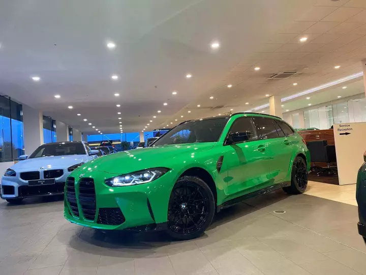 BMW M3 Touring (G81) painted in Signal Green