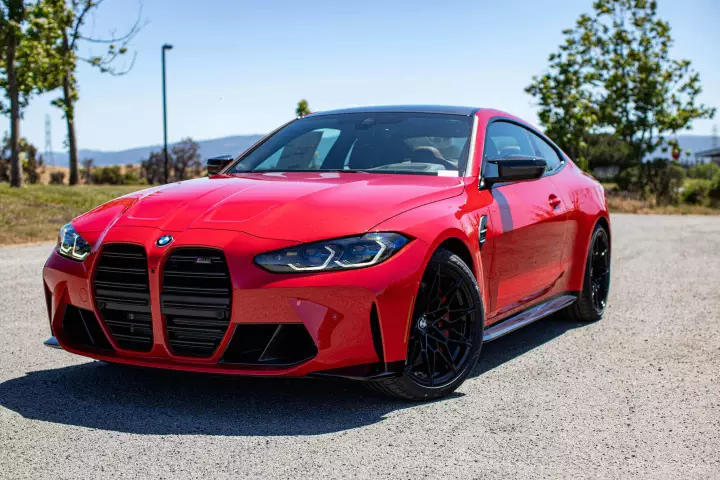 BMW M4 (G82) painted in Rosso Corsa