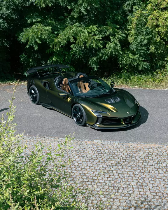 Ferrari SF90 XX Spider painted in Verde Volterra and Nero DS