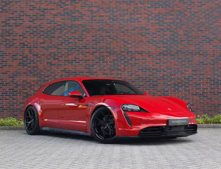Porsche Taycan Sport Turismo painted in Carmine Red