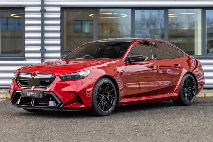 BMW M5 (G90) painted in Fire Red