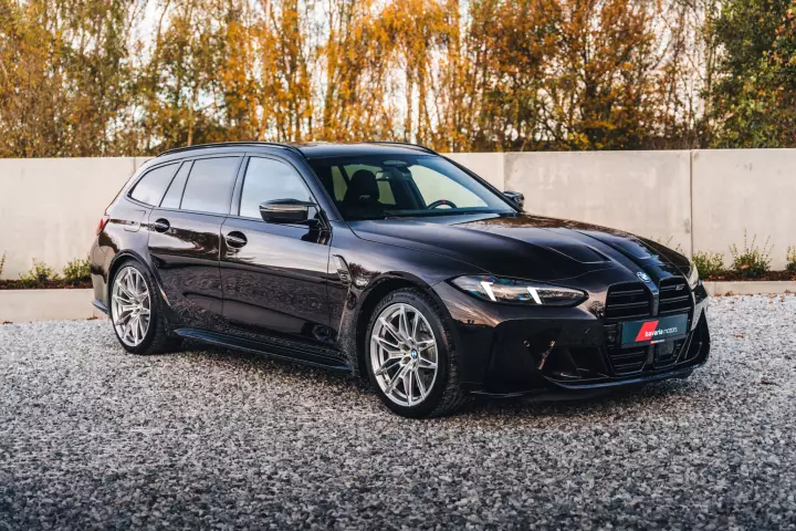 BMW M3 Touring (G81) painted in Ruby Black