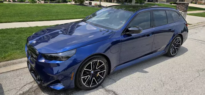 BMW M5 Touring (G99) painted in Blue Hera Mica