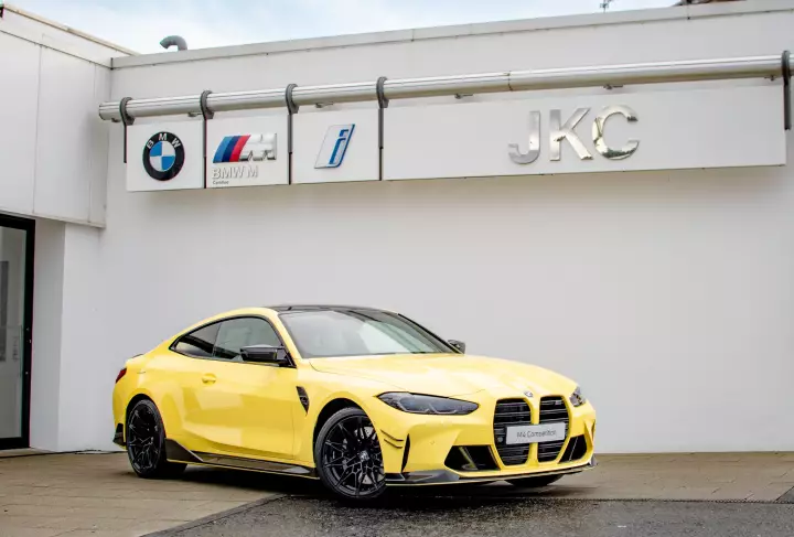 BMW M4 (G82) painted in Dakar Yellow II
