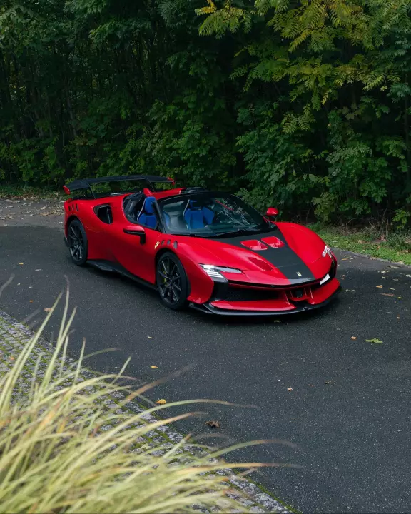 Ferrari SF90 XX Spider painted in Rosso 70 Anni and Nero DS
