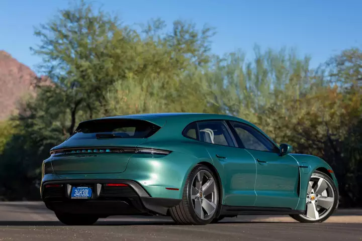 Porsche Taycan Sport Turismo painted in Racing Green Metallic