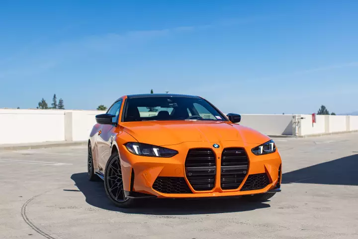 BMW M4 (G82) painted in Fire Orange III
