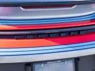 384011