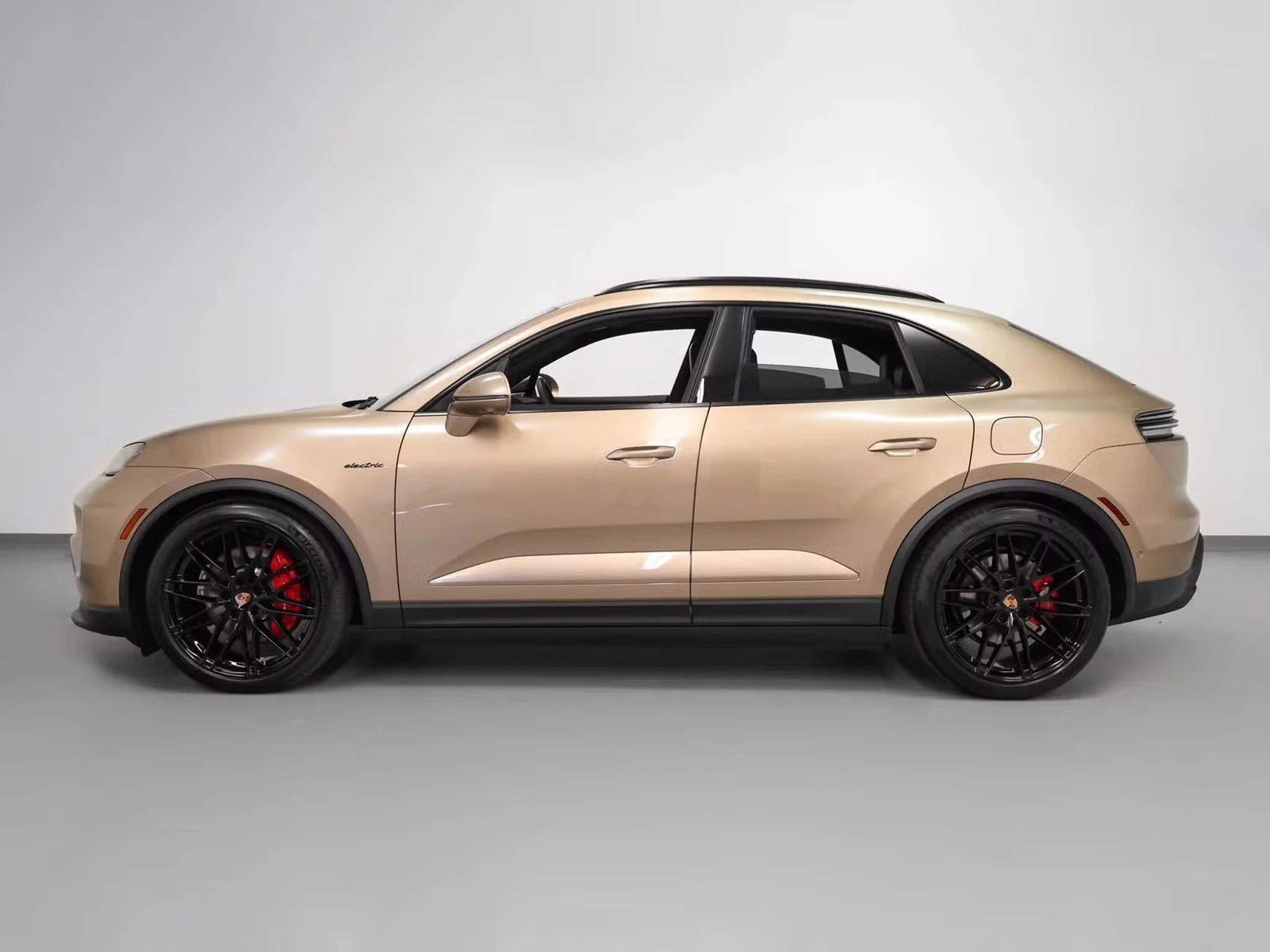 Gold Bronze Metallic Porsche Macan Electric
