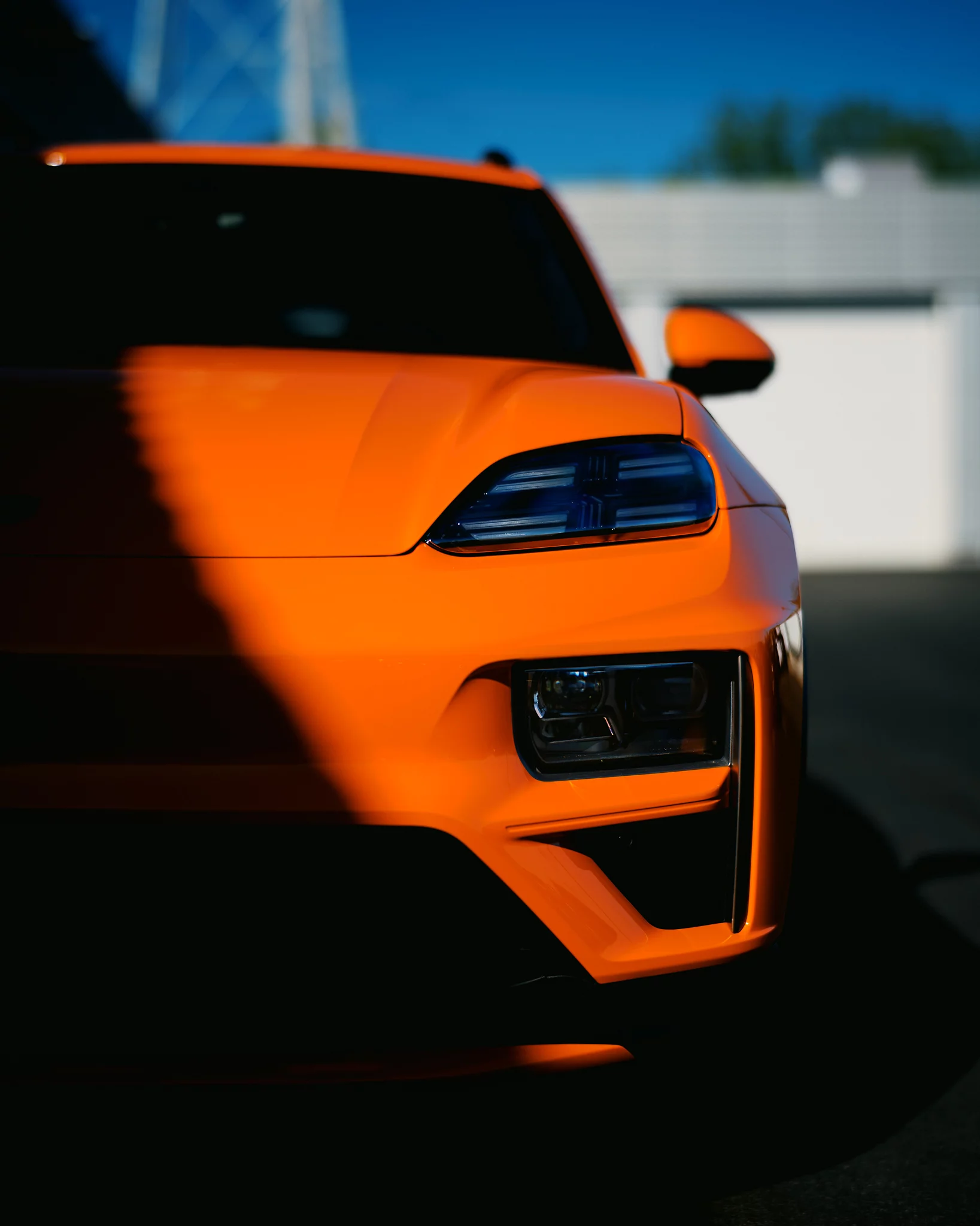 Gulf Orange Porsche Macan Electric