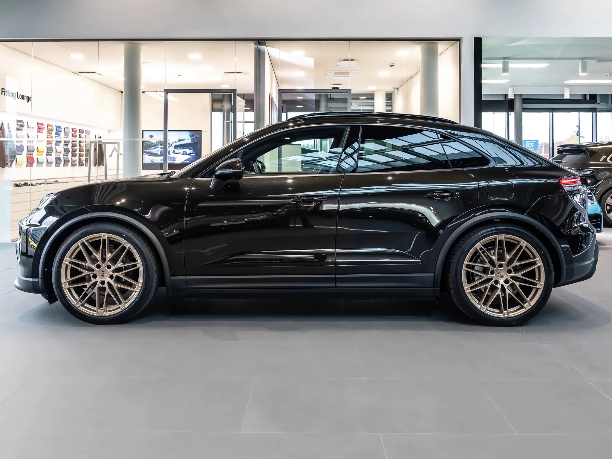 Dark Olive Metallic Porsche Macan Electric