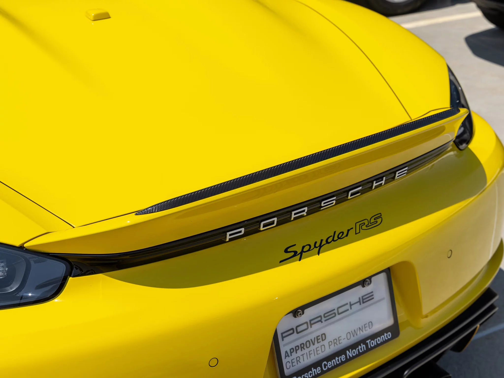 Racing Yellow Porsche 718 Spyder RS