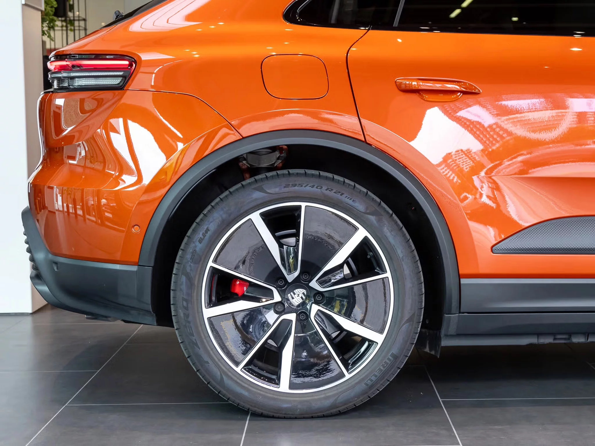 Papaya Metallic Porsche Macan Electric