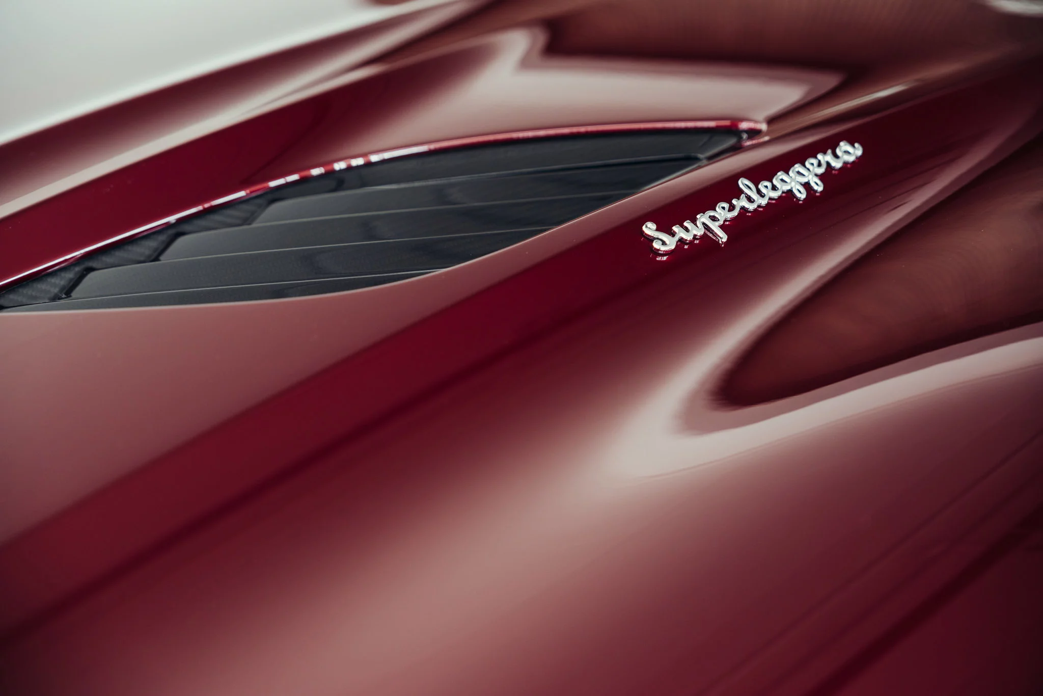 Liquid Crimson Aston Martin DBS