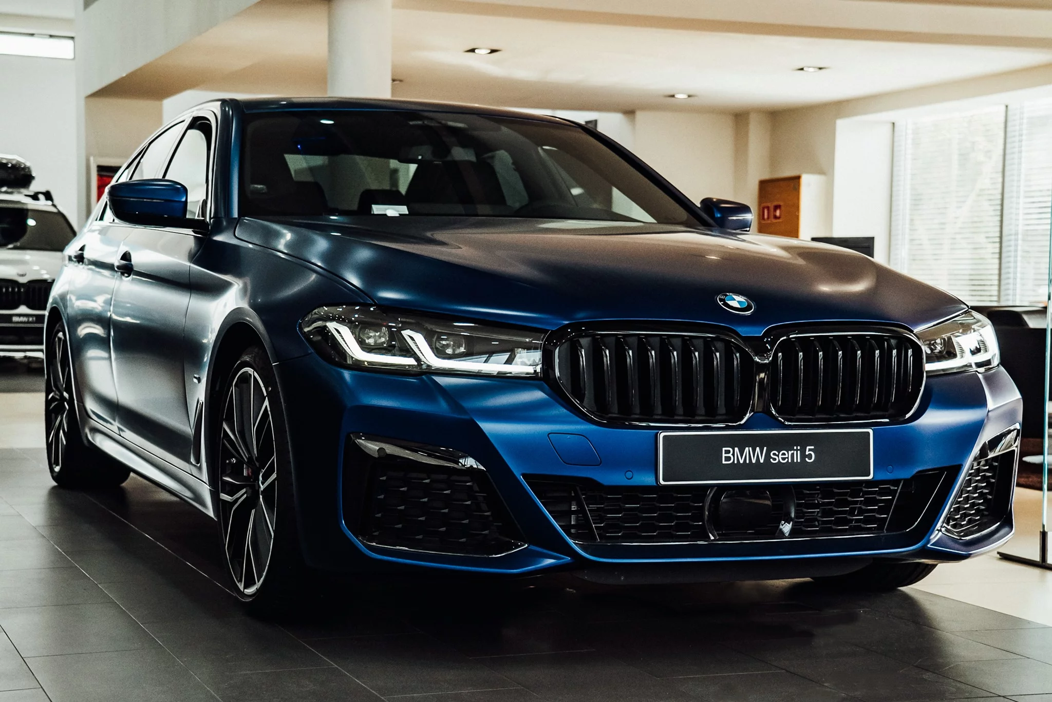 Frozen Marina Bay Blue BMW 5 Series