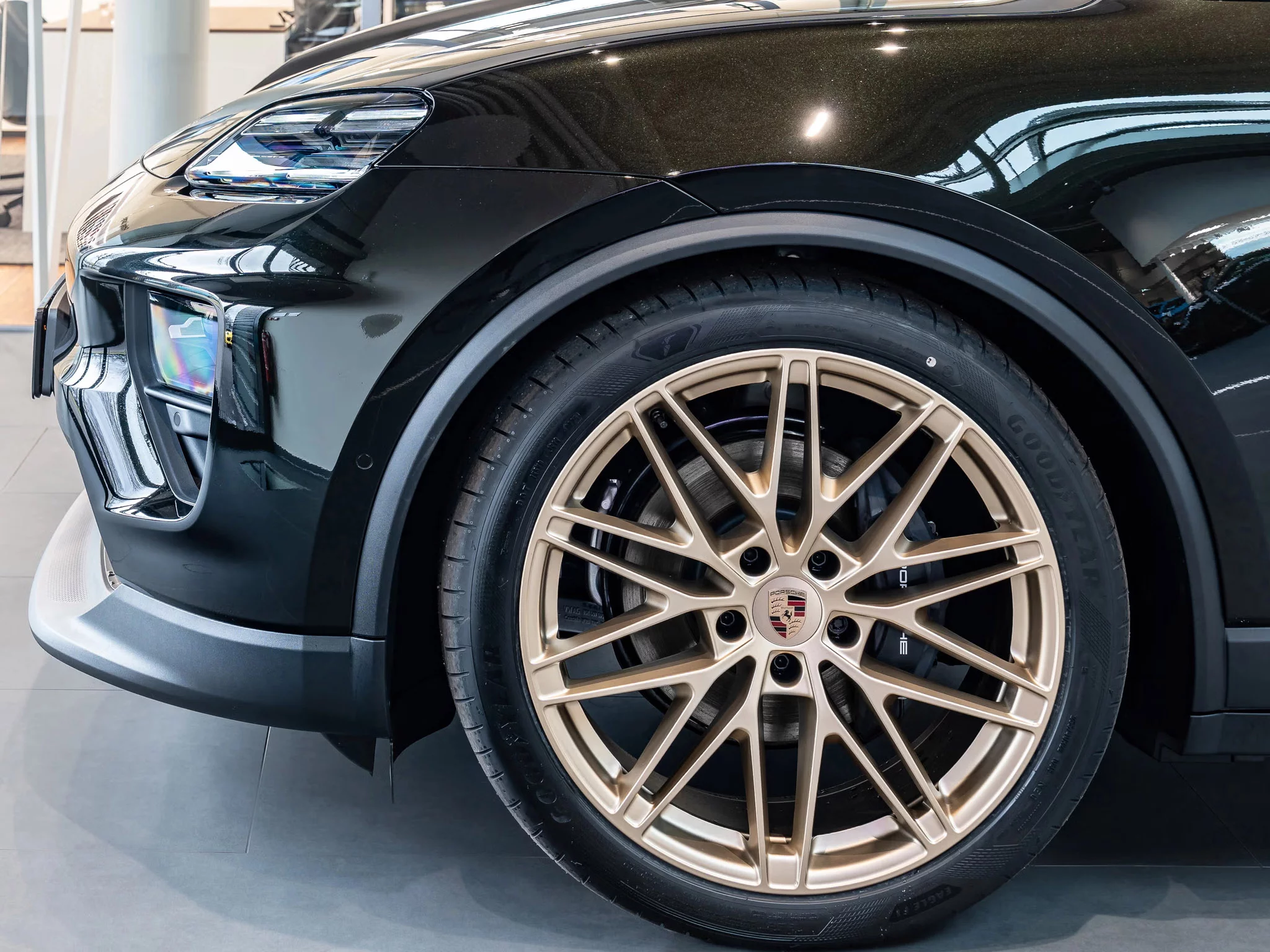 Dark Olive Metallic Porsche Macan Electric