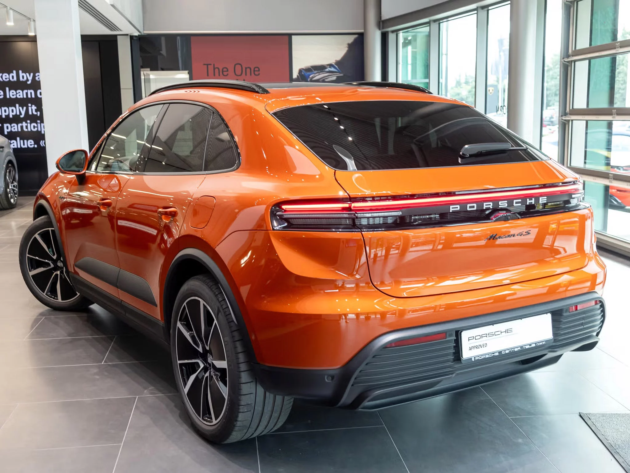 Papaya Metallic Porsche Macan Electric