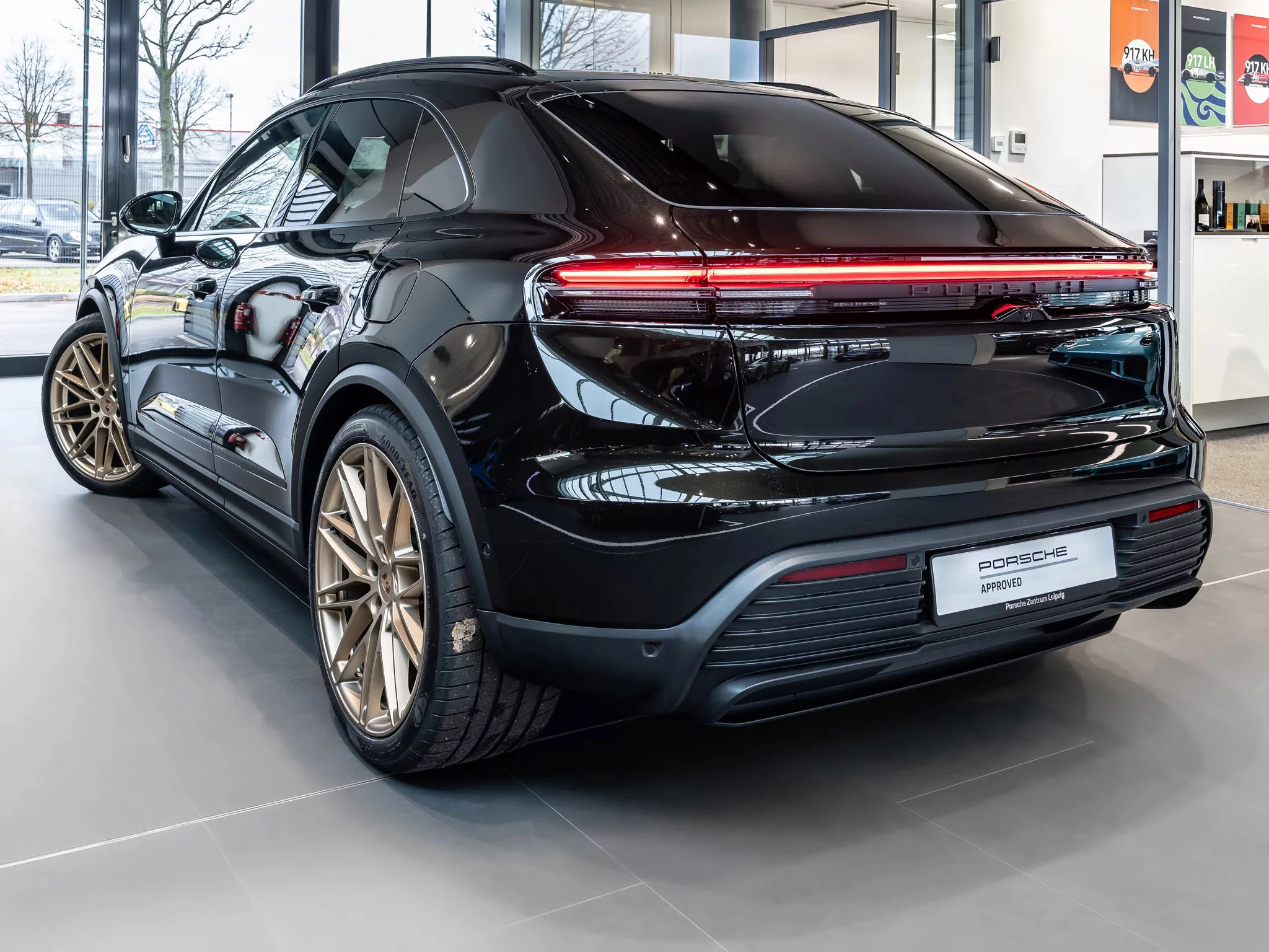 Dark Olive Metallic Porsche Macan Electric