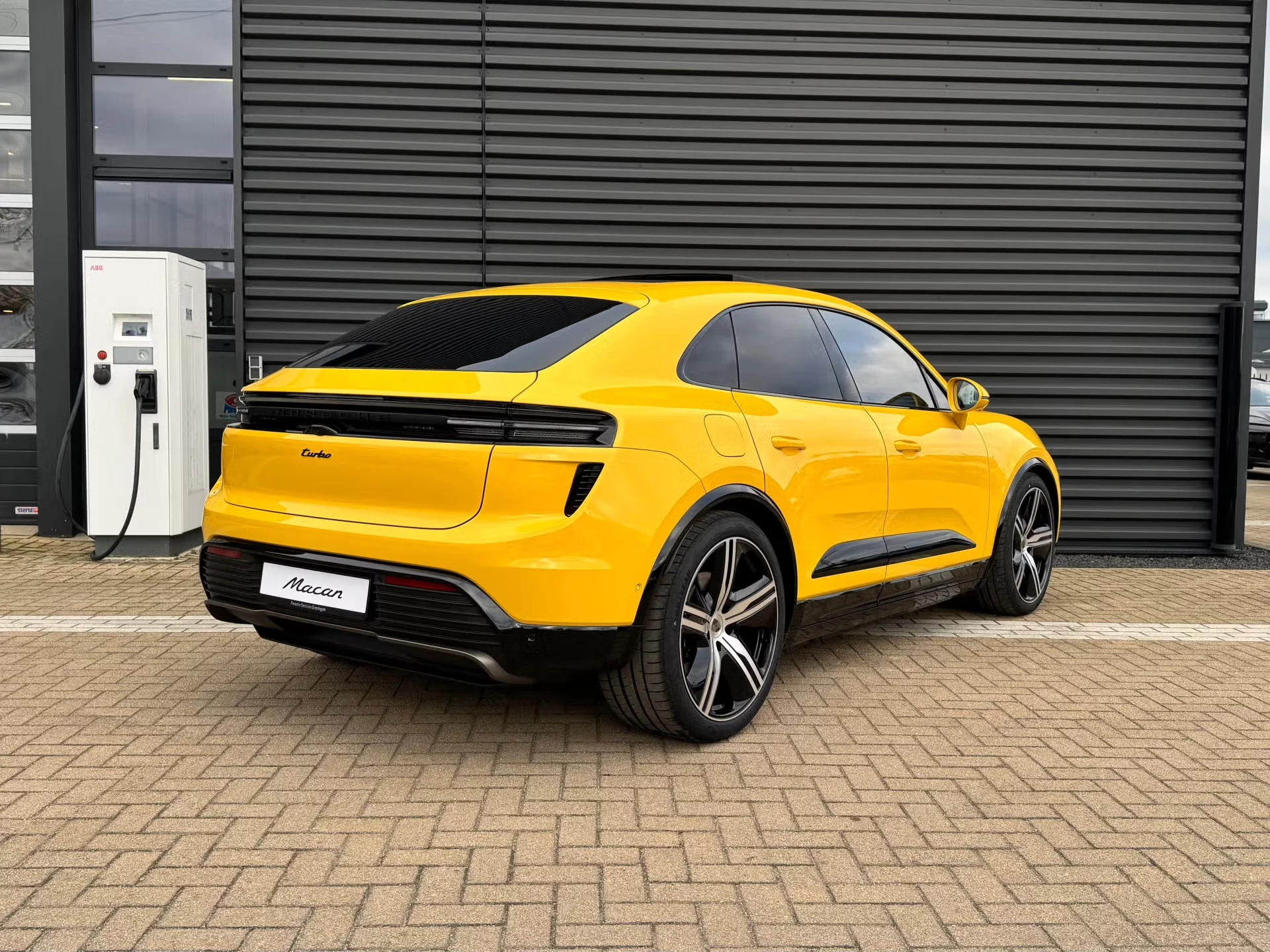 Speed Yellow Porsche Macan Electric