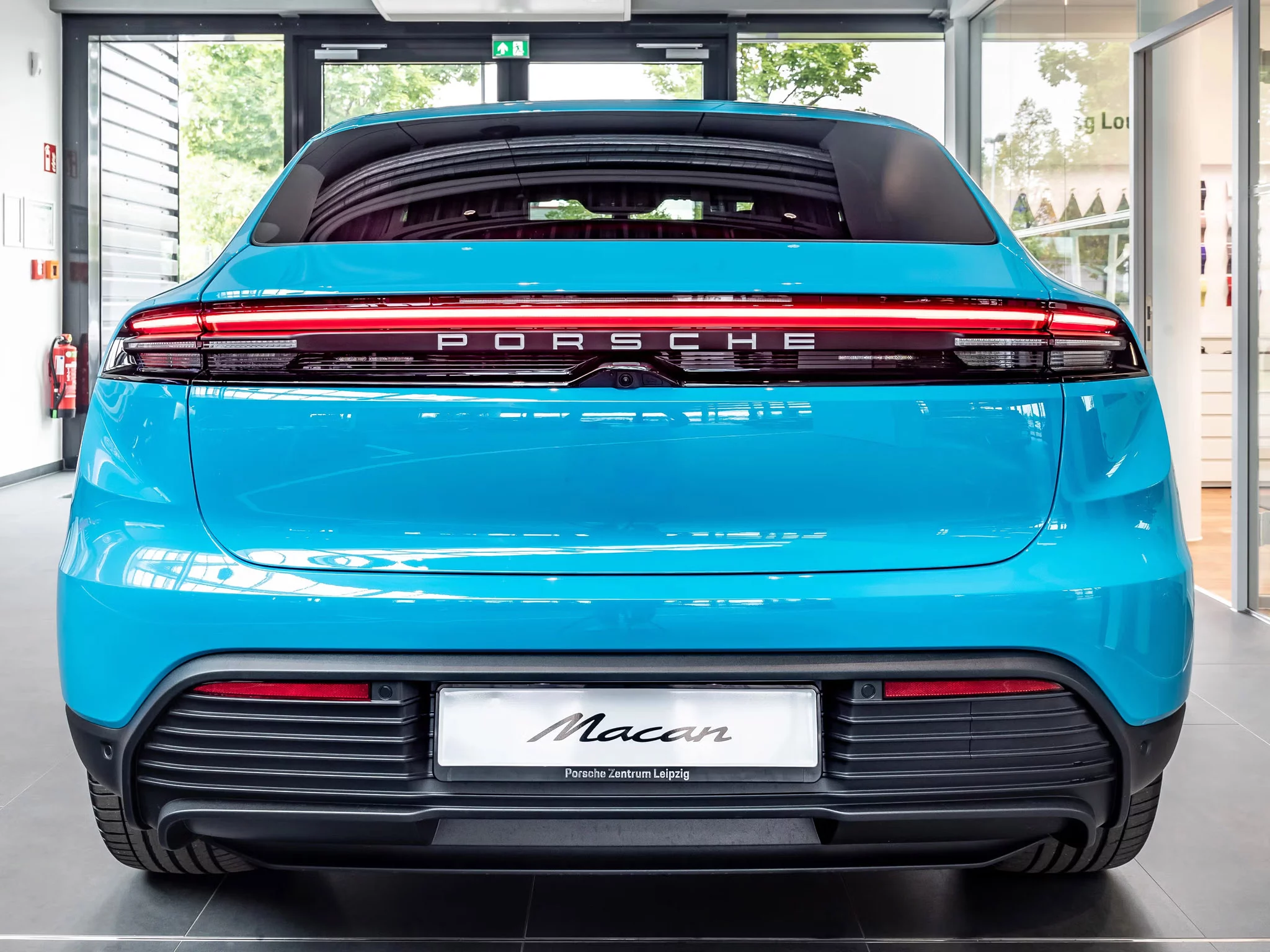 Miami Blue Porsche Macan Electric