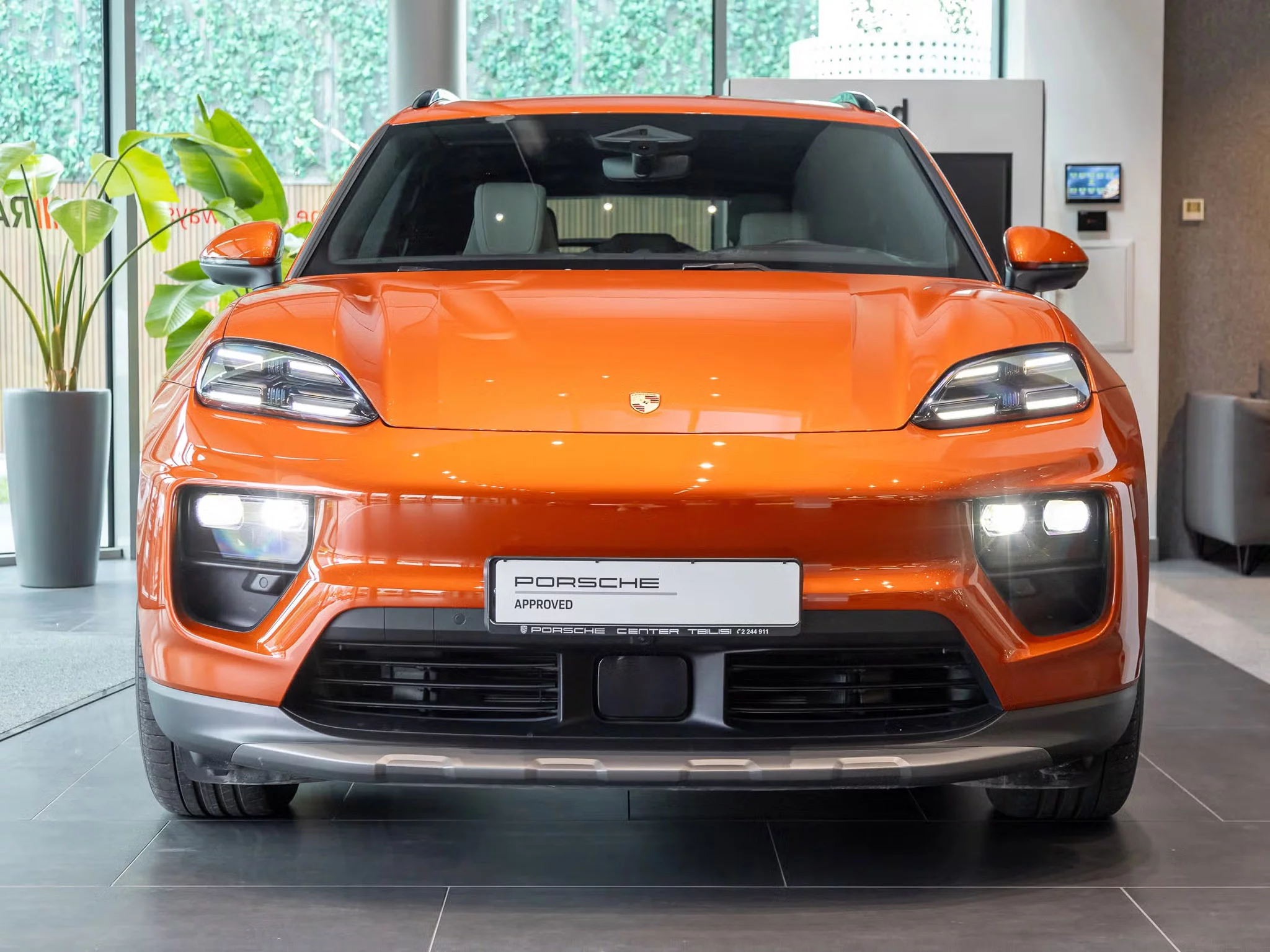 Papaya Metallic Porsche Macan Electric