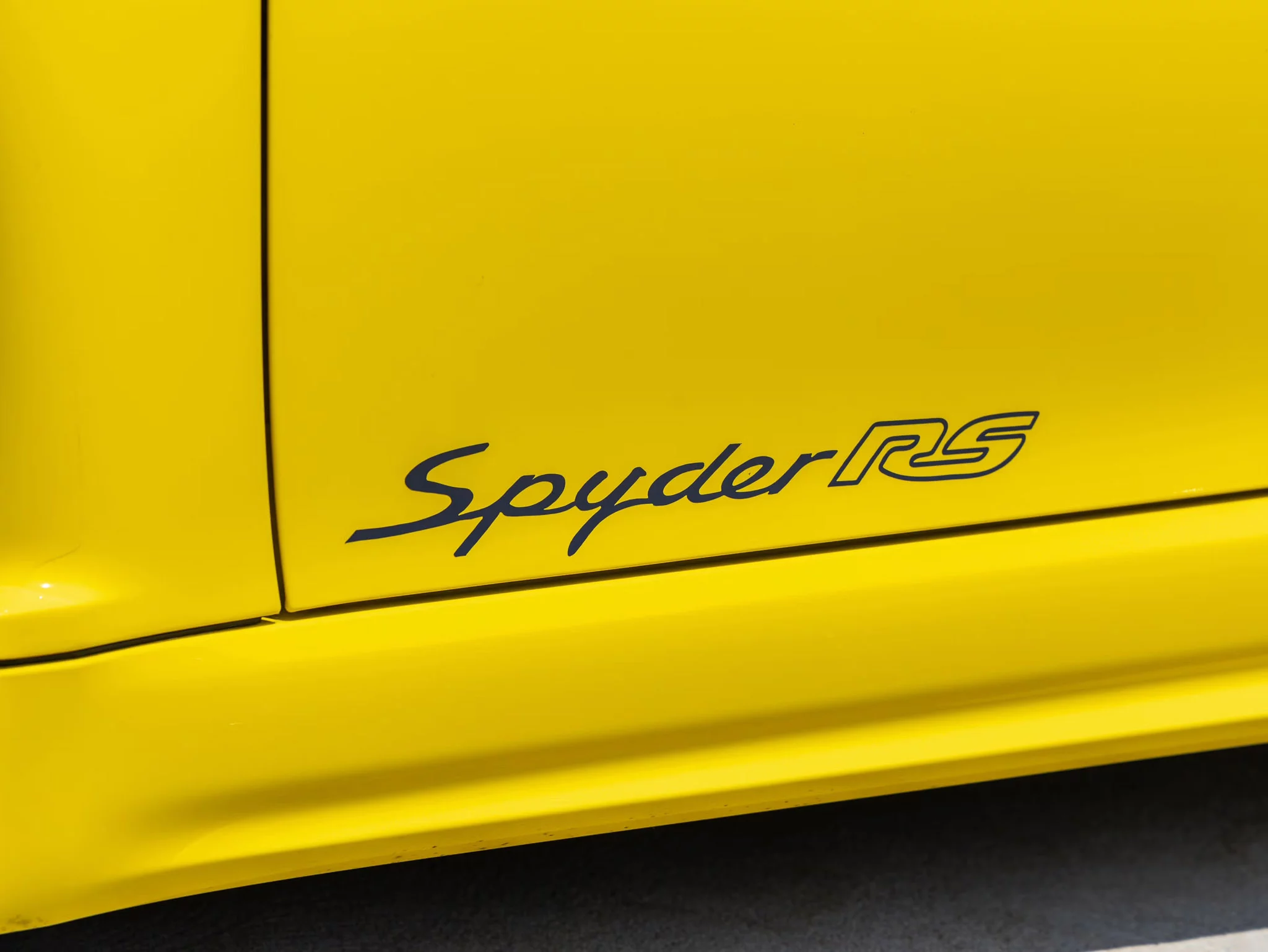Racing Yellow Porsche 718 Spyder RS