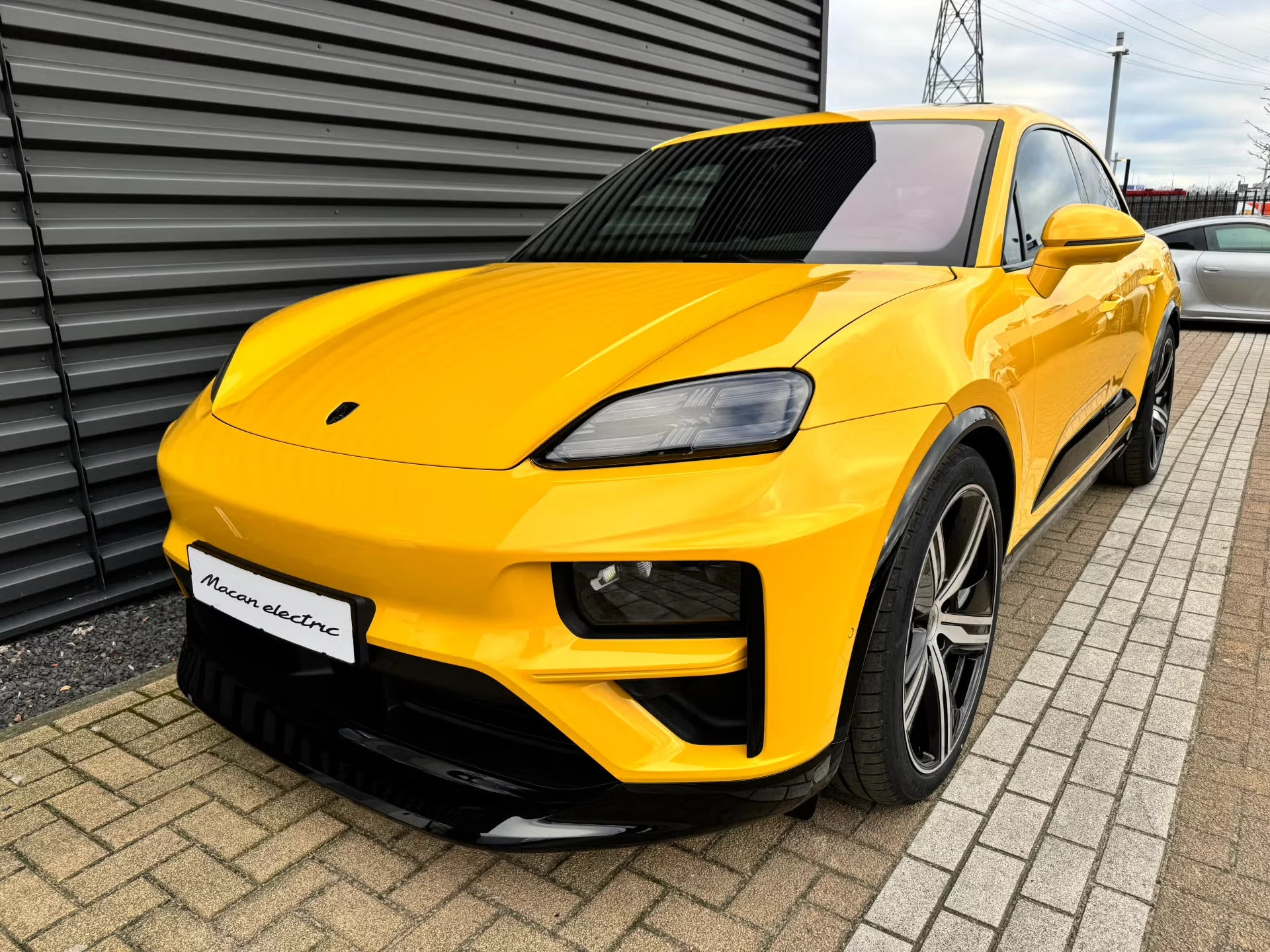 Speed Yellow Porsche Macan Electric