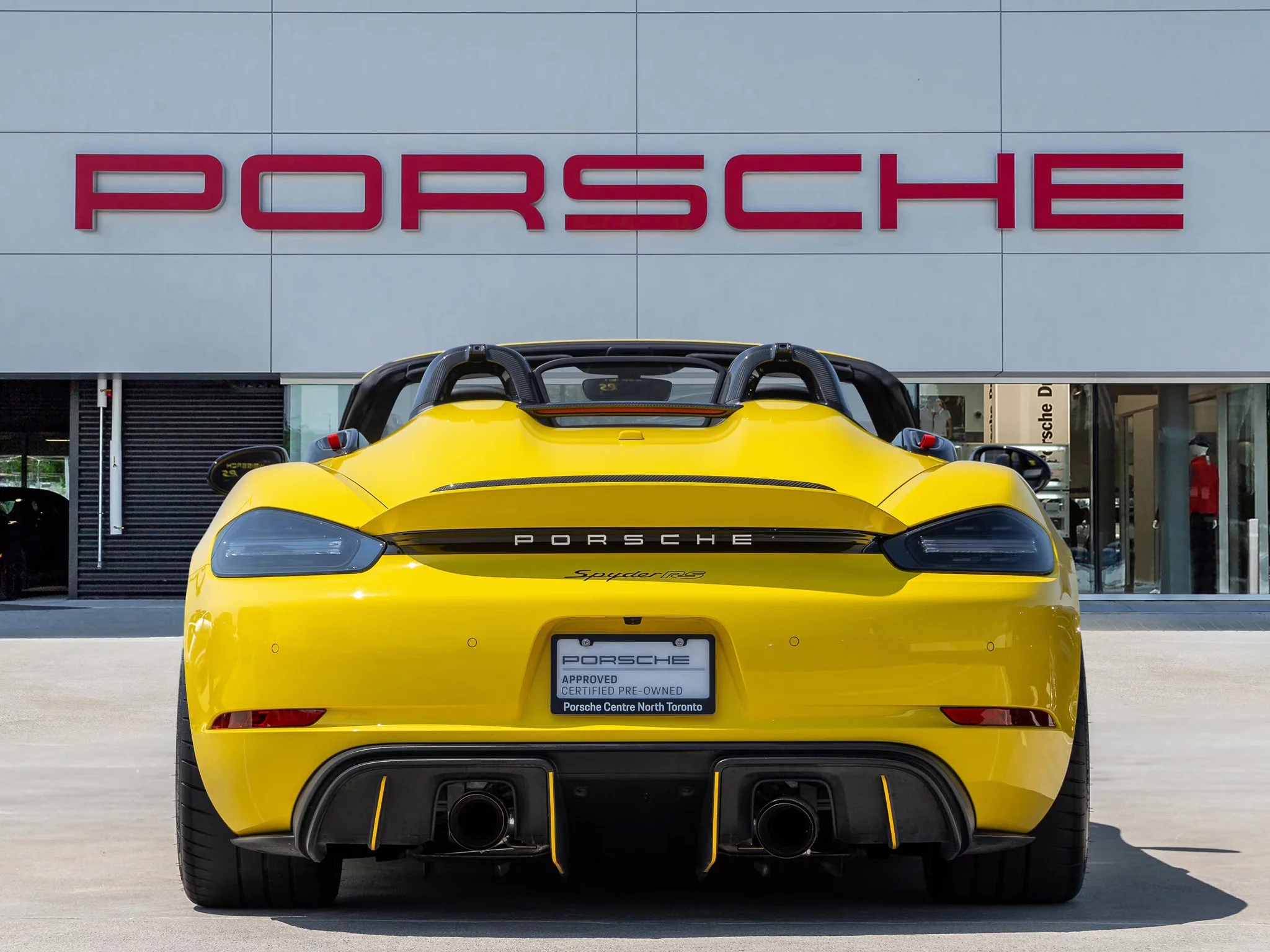 Racing Yellow Porsche 718 Spyder RS