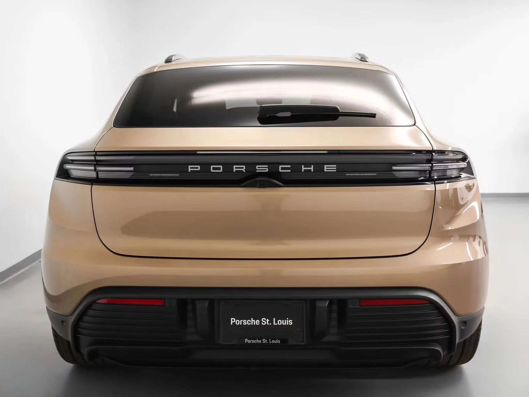 Gold Bronze Metallic Porsche Macan Electric
