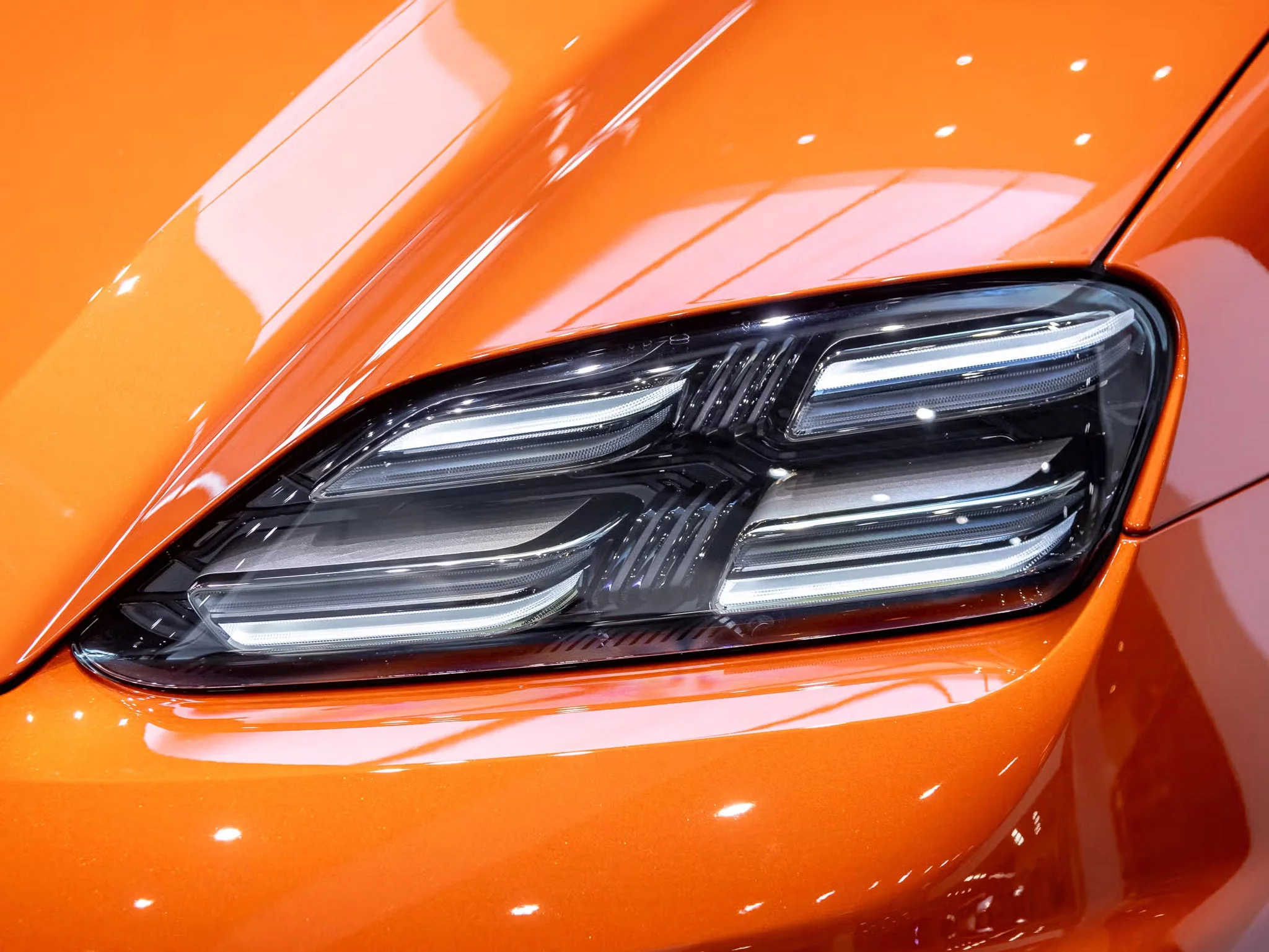 Papaya Metallic Porsche Macan Electric