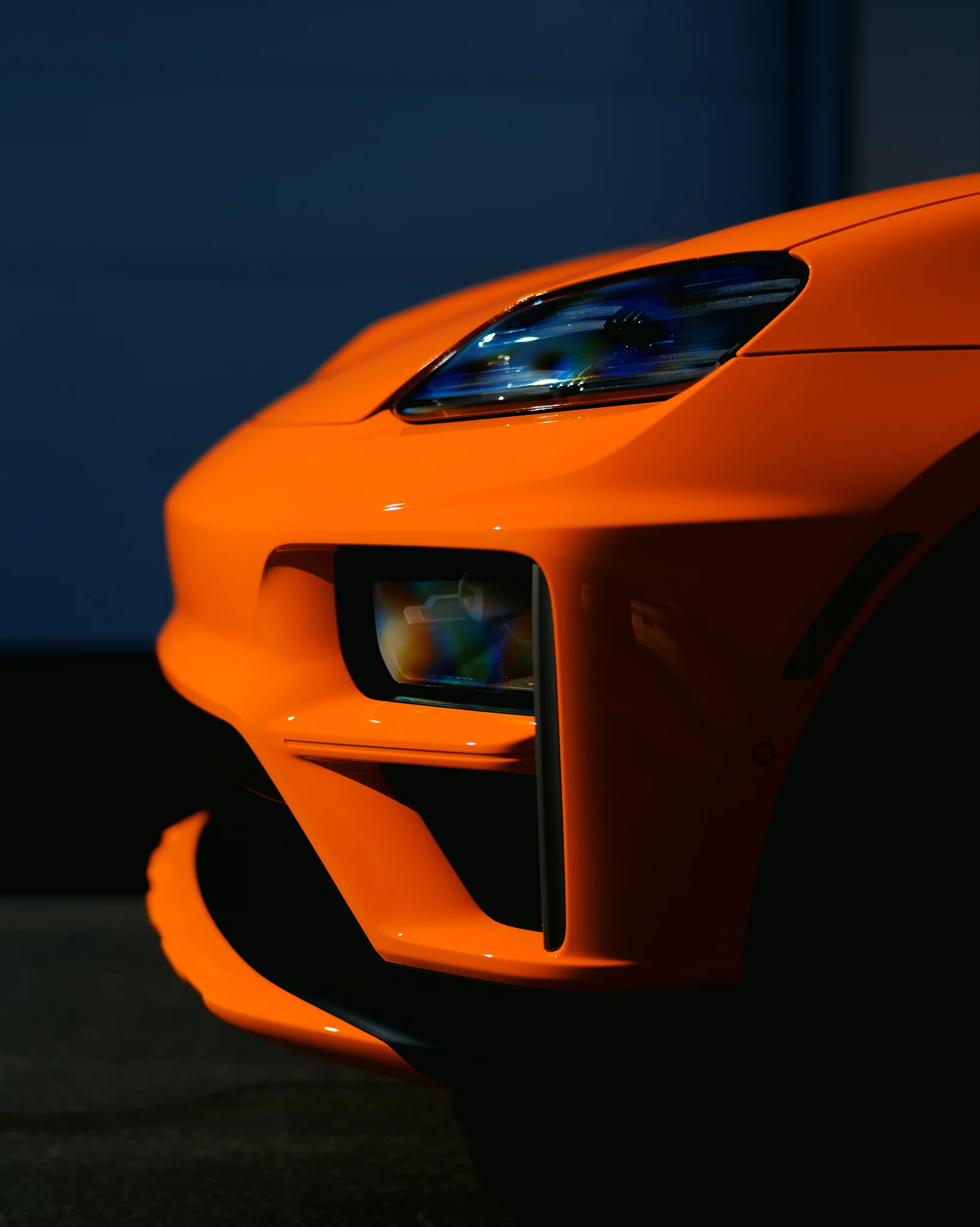 Gulf Orange Porsche Macan Electric