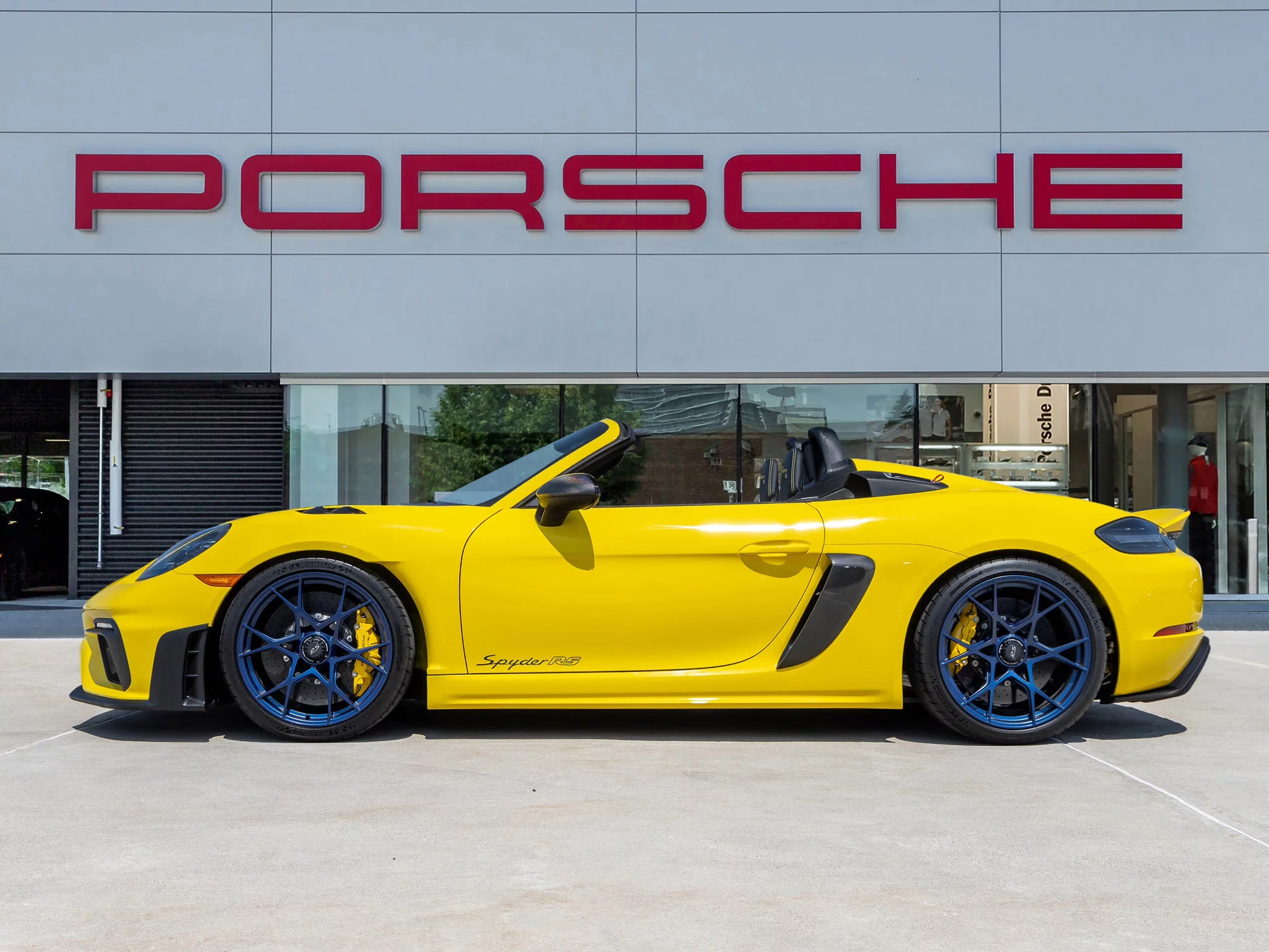 Racing Yellow Porsche 718 Spyder RS