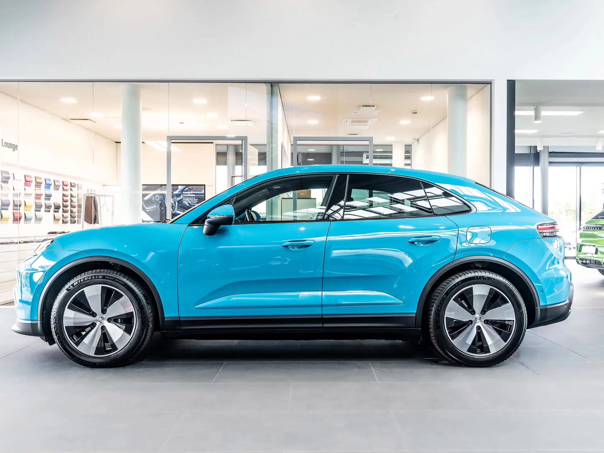 Miami Blue Porsche Macan Electric