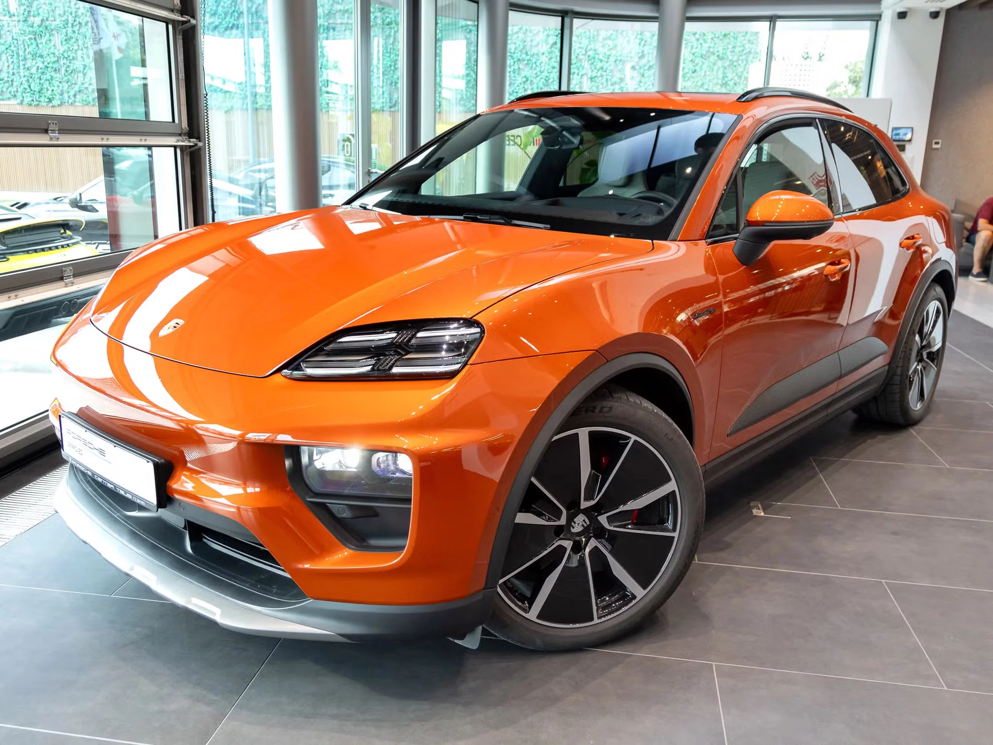 Papaya Metallic Porsche Macan Electric