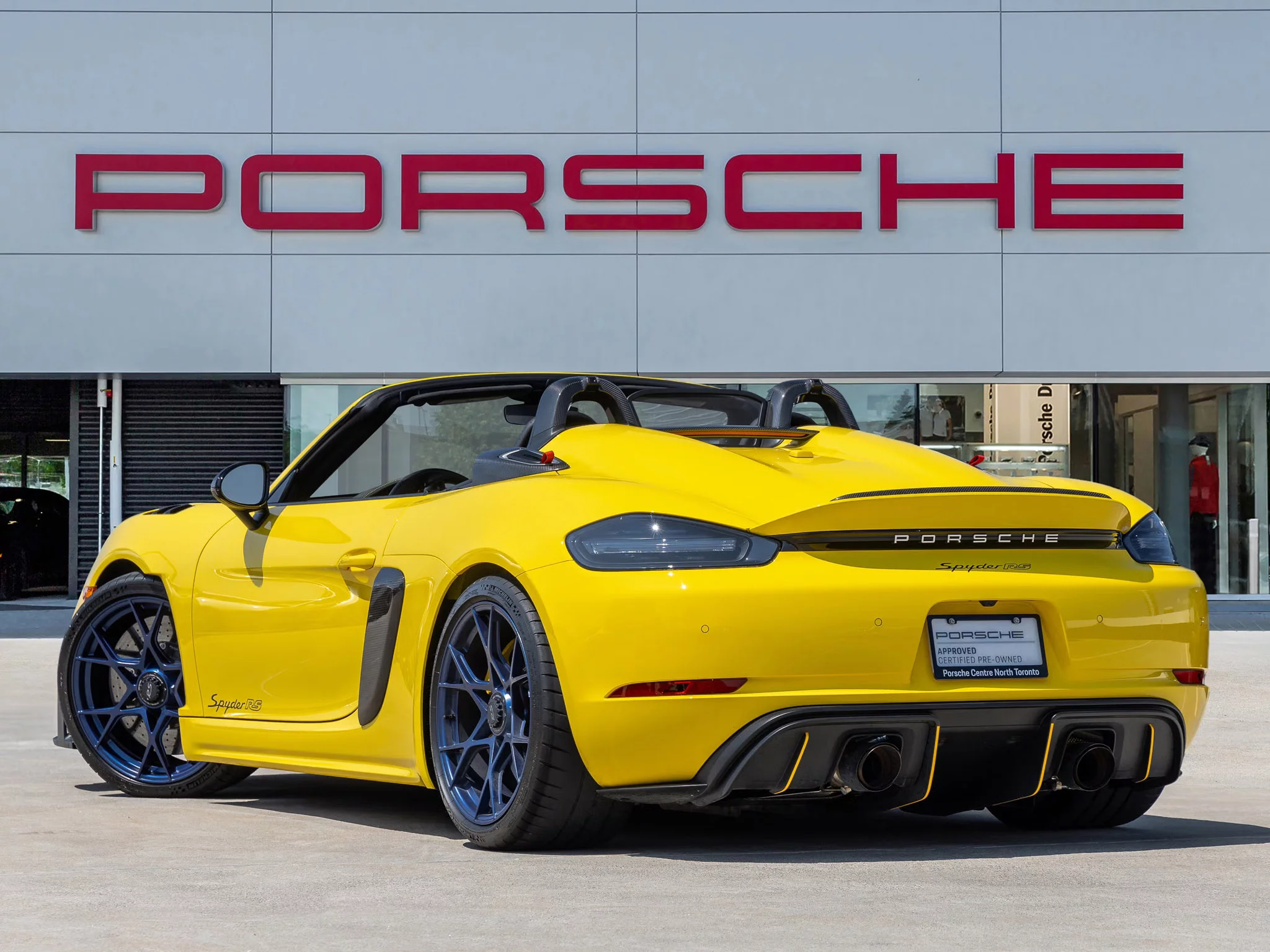 Racing Yellow Porsche 718 Spyder RS