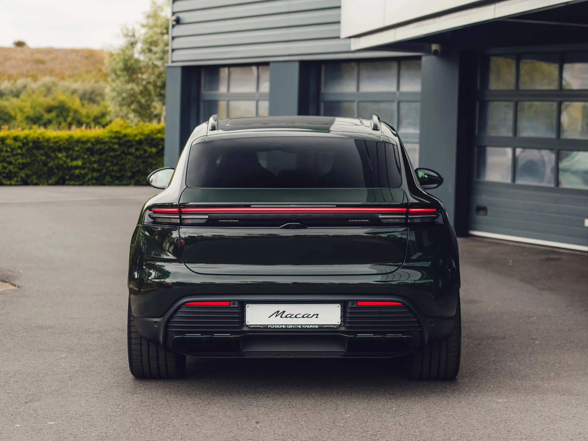 Brewster Green Porsche Macan Electric